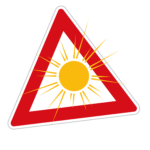 Triangle de signalisation avec un soleil.
